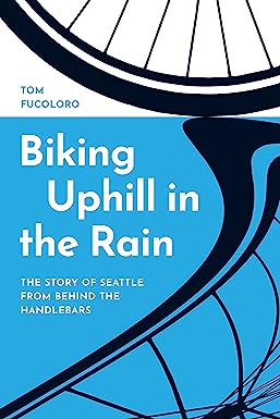 Biking Uphill in the Rain by Tom Fucoloro
